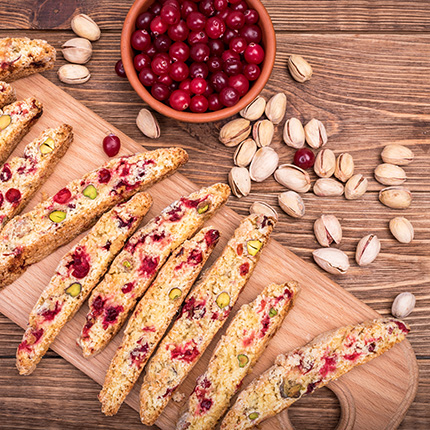 Several biscotti with cranberries and pistachio nuts